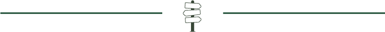 a green content divider with trail signs in the center
